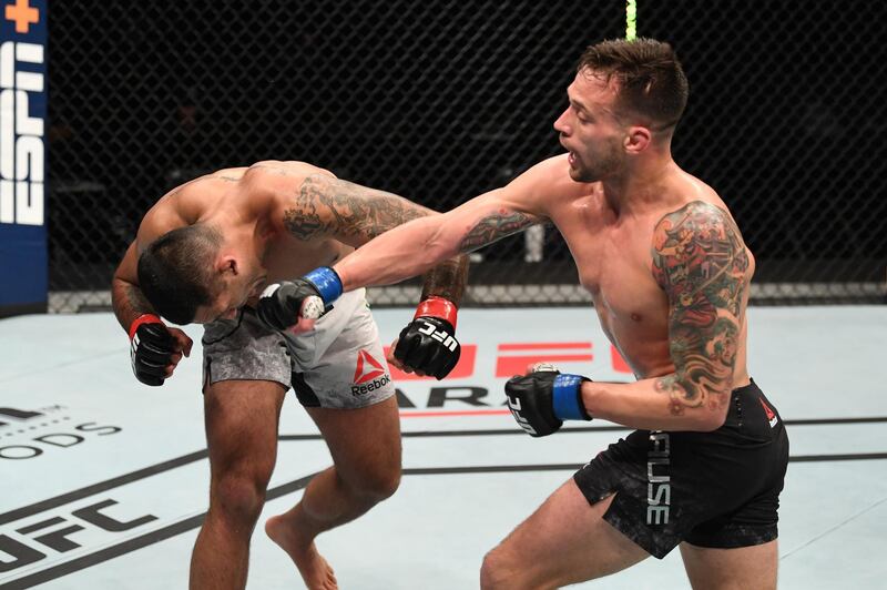 James Krause punches Claudio Silva during their welterweight bout at UFC Fight Night. Getty