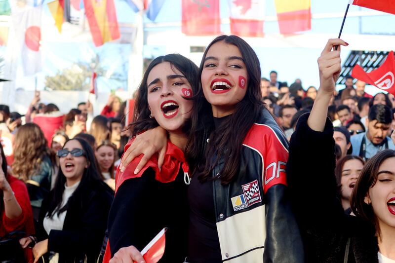 Soccer Football - FIFA World Cup Qatar 2022 - Fans in Tunis watch Tunisia v France - Tunis, Tunisia - November 30, 2022 Tunisia fans celebrate during the match at the fan zone in Tunis Jihed Abidellaoui / Reuters