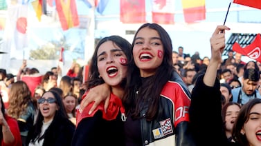 Tunisia fans celebrate during the match at the fan zone in Tunis. Reuters