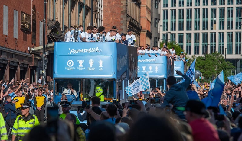Manchester City's players reacts on top of the bus during the Champions Parade, Manchester, Britain.  EPA