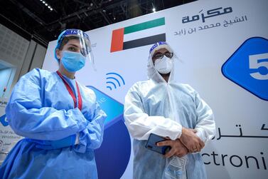 Healthcare workers at the new Covid-19 Prime Assessment Centre at Adnec pictured in August 2020. Victor Besa / The National