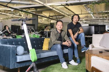 LimeBike co-founders Toby Sun (left) and Brad Bao. Mr Bao says the electric scooter hire company is "not getting unnecessarily nervous" about the fall-out from the US-China trade dispute. Bloomberg