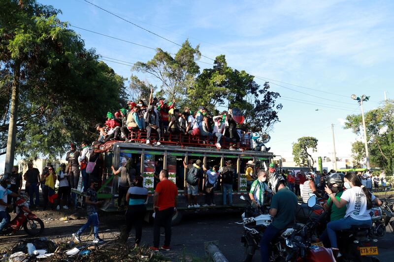 Colombian indigenous people travel on buses to participate in a protest against poverty and police violence in Cali, Colombia May 4, 2021. REUTERS/Juan B. Diaz NO RESALES. NO ARCHIVES