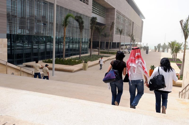 Students and staff walk at the campus of the King Abdullah University of Science and Technology in Thuwal, 80 kilometers north of Jeddah, Saudi Arabia. Omar Salem / AFP