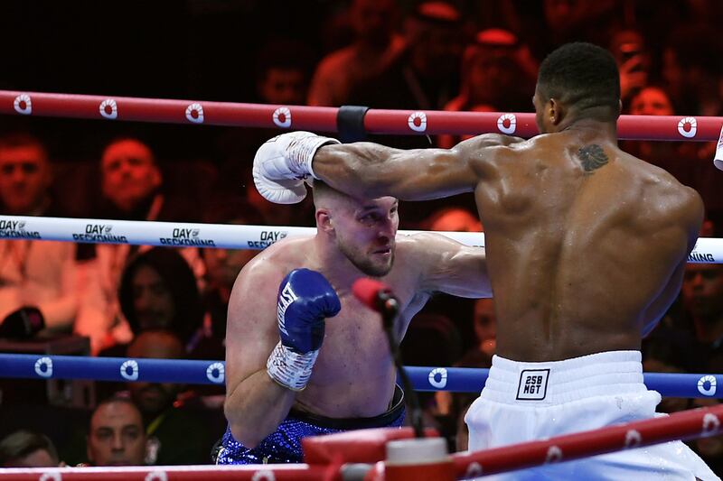 Anthony Joshua, right, easily overpowered Otto Wallin at the Kingdom Arena. AP