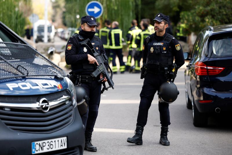 Police stands outside of Ukrainian embassy in Madrid after Spanish police said a blast at injured one employee while handling a letter. Reuters.