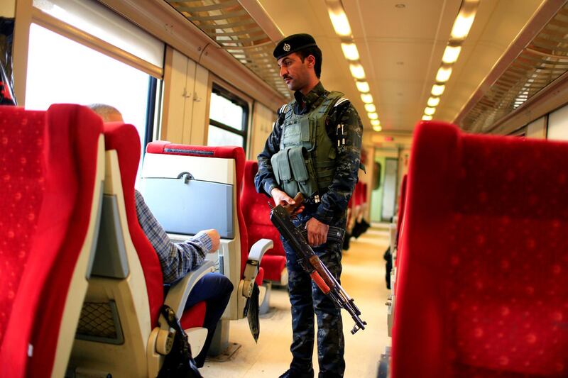 A policeman guards a carriage of the train from Baghdad to Fallujah. Reuters