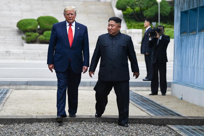 US President Donald Trump meets with North Korean leader Kim Jong-un at the demilitarised zone separating the two Koreas, in Panmunjom, South Korea. AFP