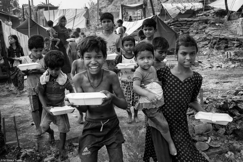 'Happy with Food' by M Yousuf Tushar (Bangladesh) - second place in the World Food Programme Food for Life category