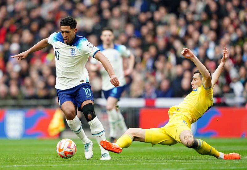 England's Jude Bellingham is tackled by Ukraine's Taras Stepanenko. PA