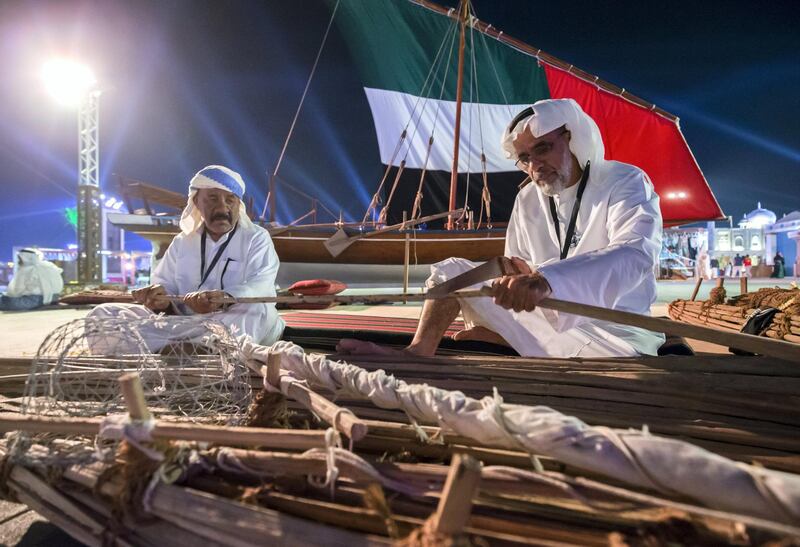 AL WATHBA, UNITED ARAB EMIRATES- Local Emirati showing how they make boat at Sheikh Zayed Heritage.  Leslie Pableo for The National