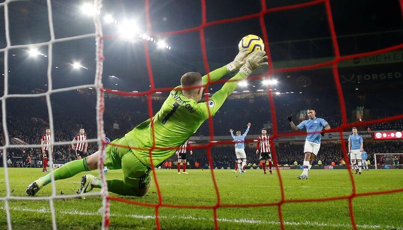 Sheffield United's Dean Henderson saves a penalty from Manchester City's Gabriel Jesus. Reuters