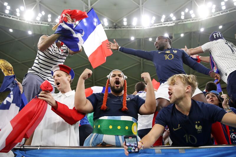 France fans celebrate after the 3-1 win. Getty Images