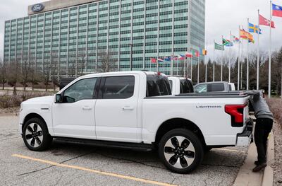 The all-new Ford F-150 Lightning electric pickup outside the Ford Motor Company world headquarters in Dearborn. Reuters