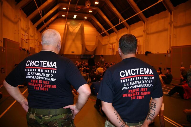 Steven Flaherty, right, and another instructor prepare to teach a class during a seminar with Russian Systema expert Vladimir Vasiliev. Courtesy: Steven Flaherty