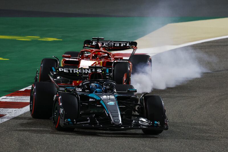 George Russell of Mercedes and Charles Leclerc of Ferrari battle. Getty Images
