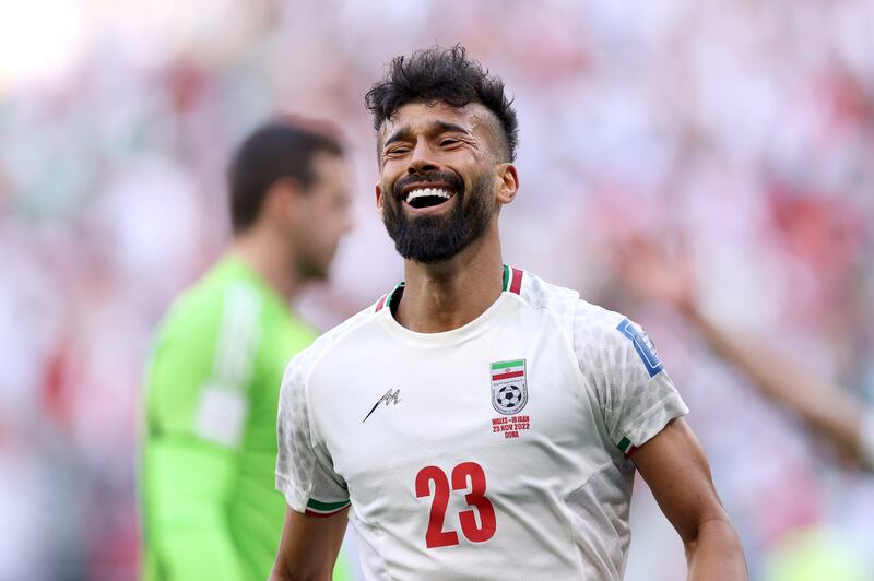 Ramin Rezaeian of Iran celebrates scoring his team's second goal. Getty