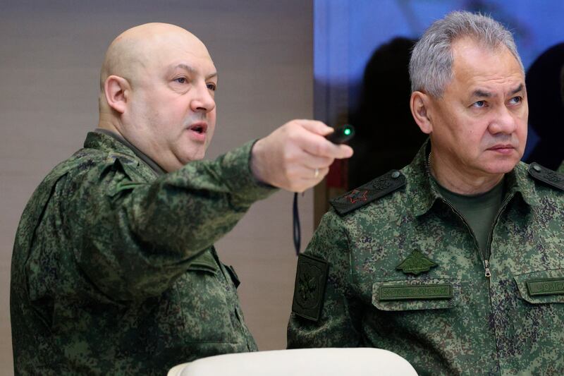 Sergei Surovikin, left, and Russian Defence Minister Sergei Shoigu, at a meeting with Russian President Vladimir Putin last year. AP