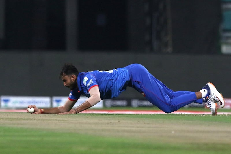 Axar Patel of Delhi Capitals  dives to stop the ball  during match 11 of season 13 of Indian Premier League (IPL) between the Delhi Capitals and the Sunrisers Hyderabadheld at the Sheikh Zayed Stadium, Abu Dhabi  in the United Arab Emirates on the 29th September 2020.  Photo by: Pankaj Nangia  / / Sportzpics for BCCI