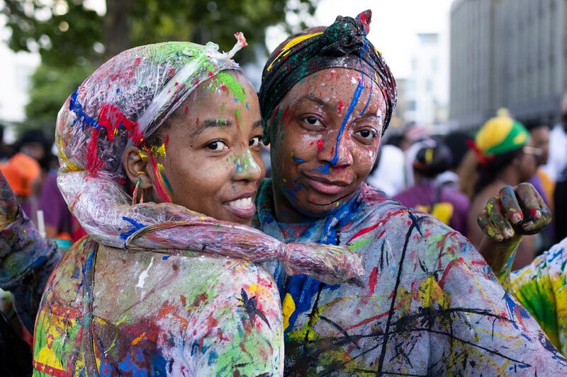 Revellers covered in paint as the opening of the Notting Hill carnival begins with 'J'Ouvert' in London. The Notting Hill Carnival has returned after a two-year break due to the Coronavirus pandemic. Getty Images