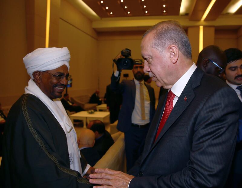 Turkey's President Recep Tayyip Erdogan, right, and Sudan's President Omar al-Bashir speak during an extraordinary summit of the Organization of Islamic Cooperation (OIC), in Istanbul, Turkey, Friday, May 18, 2018. Turkey has called on Muslim nations to stand with Palestinians and to work to stop countries joining the United States in relocating their Israeli embassy from Tel Aviv to Jerusalem. (Presidential Press Service/Pool via AP)