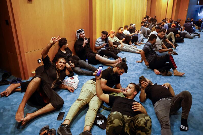 Protesters inside the parliament building. Reuters