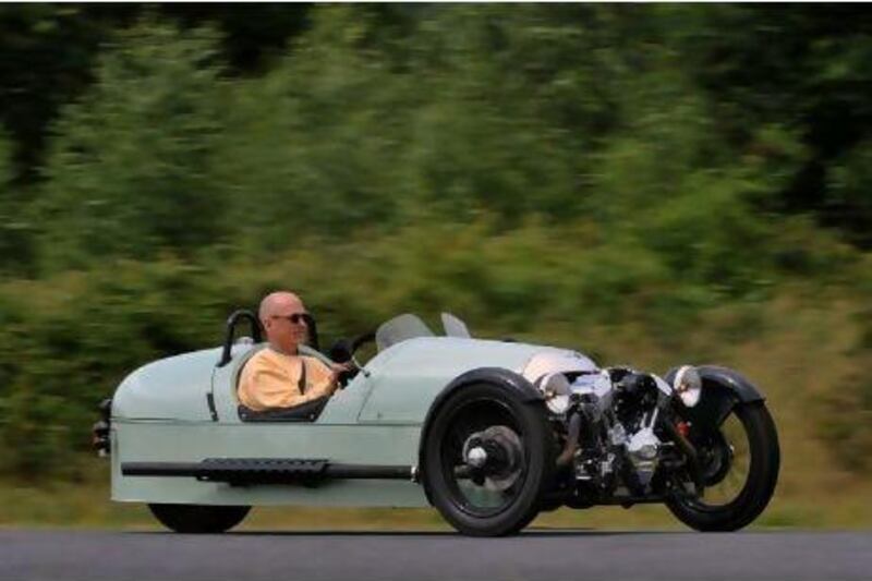 The new Morgan 3 Wheeler, seen here driven in France, is lightweight and has 115hp, so it's fast - but poor braking means it stays that way longer than a driver might want.