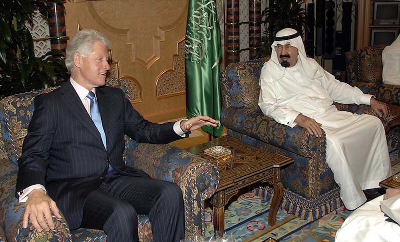 King Abdullah meets former US president Bill Clinton in Riyadh on April 7, 2010. Saudi Press Agency / AFP