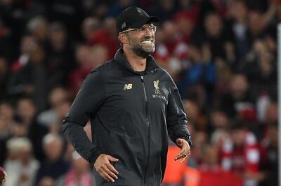 Liverpool's German manager Jurgen Klopp gestures after the UEFA Champions League group C football match between Liverpool and Paris Saint-Germain at Anfield in Liverpool, north west England on September 18, 2018.  / AFP / Paul ELLIS
