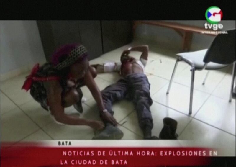An injured man lies on the floor of a hospital, following explosions at a military base, according to local media, in Bata, Equatorial Guinea. Reuters