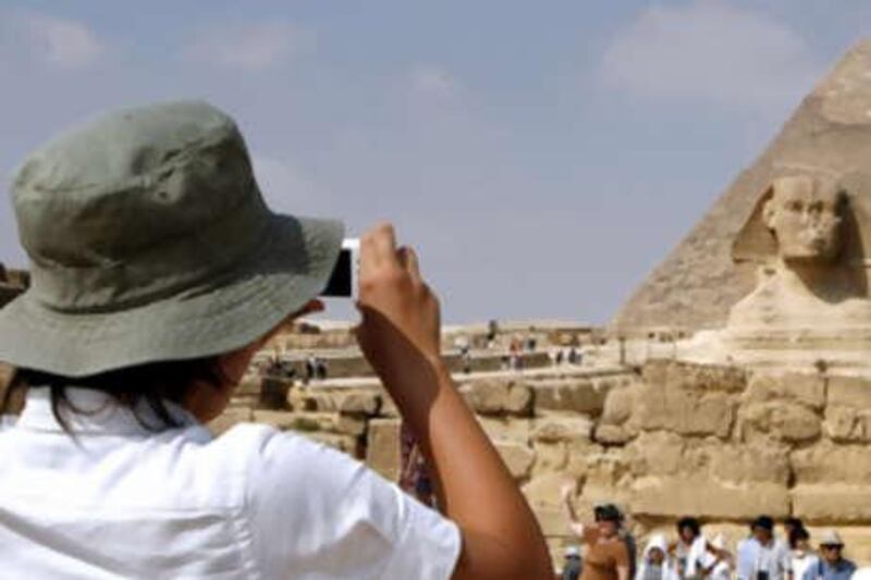 Unprepared tourists are easy prey for aggressive touts in Giza.
