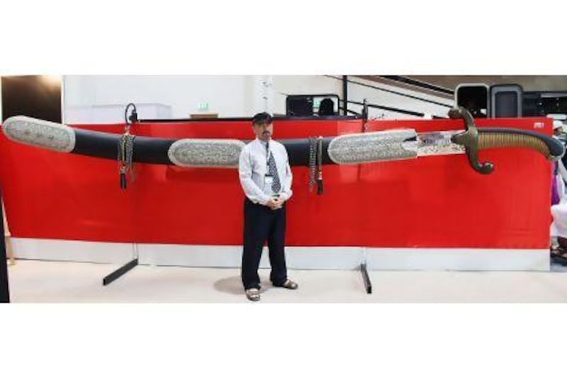 Artist Emad Ghalghay crafted what could be the world's longest sword, on public display for the first time at Adihex this week. He also showcased a three-metre long dagger.