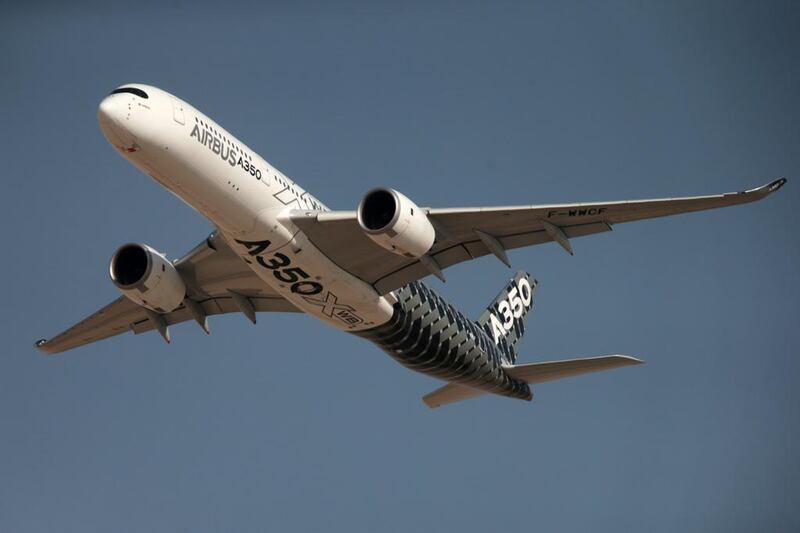 An Airbus A350 performs a fly past during opening day of the Dubai Airshow. Christopher Pike / The National