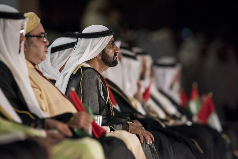 Sheikh Mohammed bin Rashid, Vice President and Ruler of Dubai (C), attends the 44th UAE National Day celebrations held at Zayed Sports City. Seen with King Mohammed VI of Morocco (2nd L). Rashed Al Mansoori / Crown Prince Court - Abu Dhabi