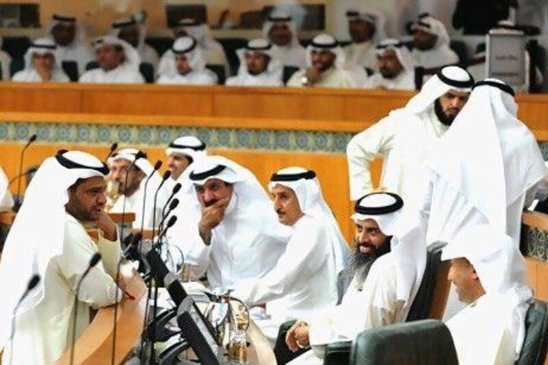 Kuwaiti MPs attend a parliament session at the national assembly in Kuwiat city on May 23,2012.