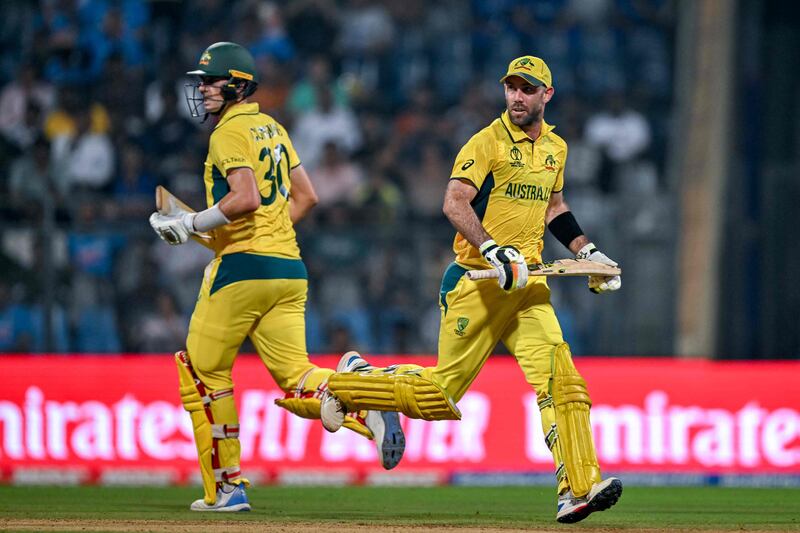 Australia's Glenn Maxwell and captain Pat Cummins, left, starred in a double ton stand with Cummins scoring just 12.  AFP