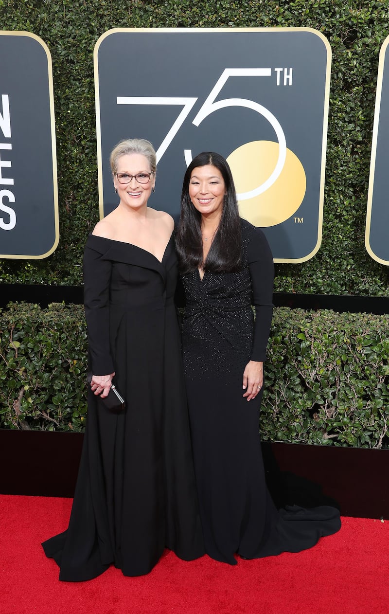 epa06423819 Meryl Streep (L) and Ai-jen Poo arrive for the 75th annual Golden Globe Awards ceremony at the Beverly Hilton Hotel in Beverly Hills, California, USA, 07 January 2018. Meryl Streep wears custom Vera Wang Collection. EPA-EFE/MIKE NELSON