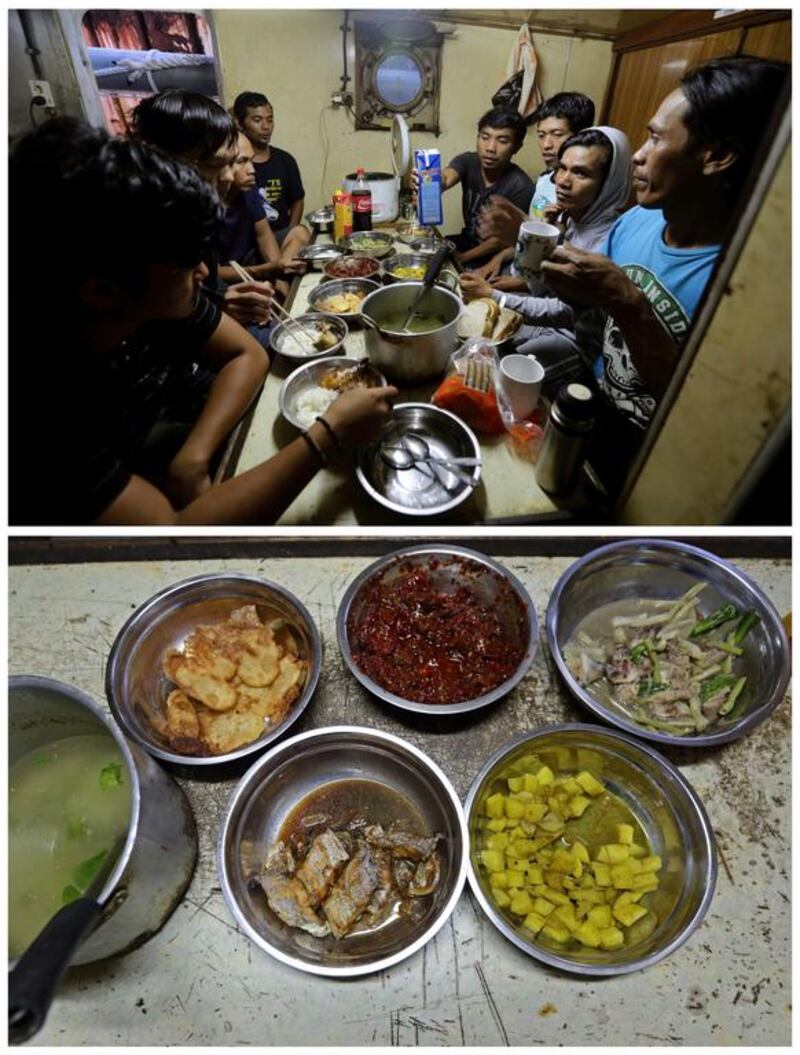 Fishermen from Suriname and Indonesia breaking fast together aboard the Nisshin Maru No 7 fishing trawler, docked along the Suriname River at Livorno, Suriname on June 9, 2016. Photo by Ranu Abhelakh