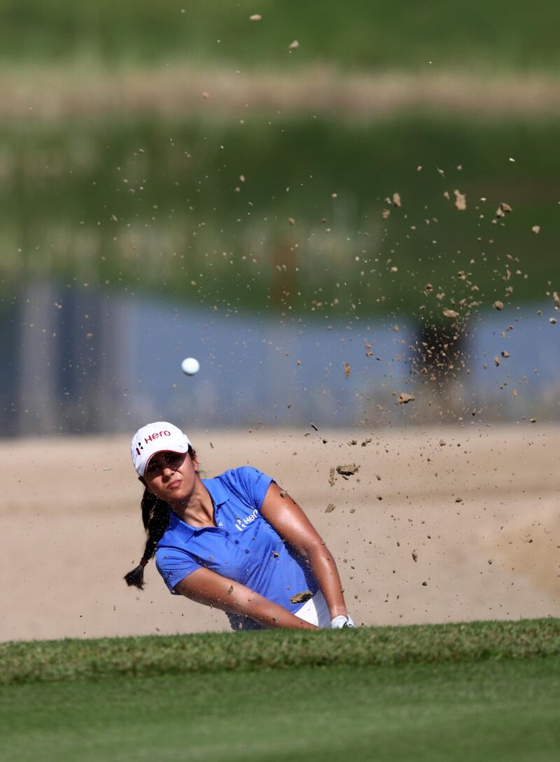 India's Tvesa Malik of India plays out of a bunker. Getty