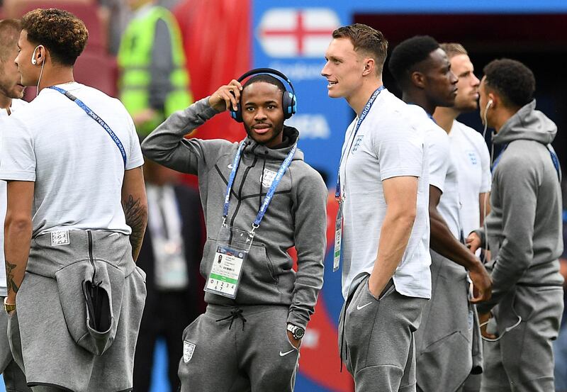 Raheem Sterling of England, second left, on the pitch before the semi final against Croatia. EPA