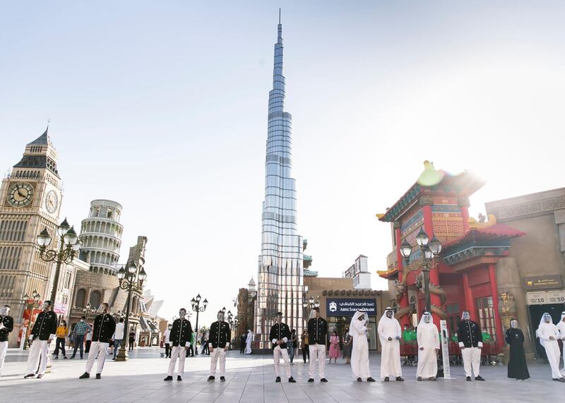 DUBAI, UNITED ARAB EMIRATES. 25 OCTOBER 2020. 
Checkers line up at the entrance of Global Village. GV celebrates it’s 25th season this year.
(Photo: Reem Mohammed/The National)

Reporter:
Section: