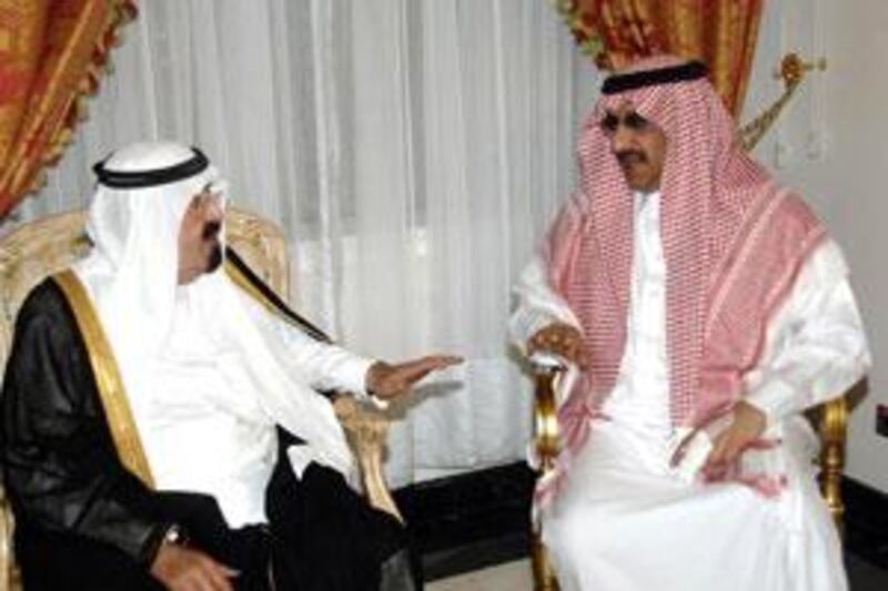 The Saudi King Abdullah, left, meets Prince Mohammed bin Nayef after the attack on him in Jeddah.