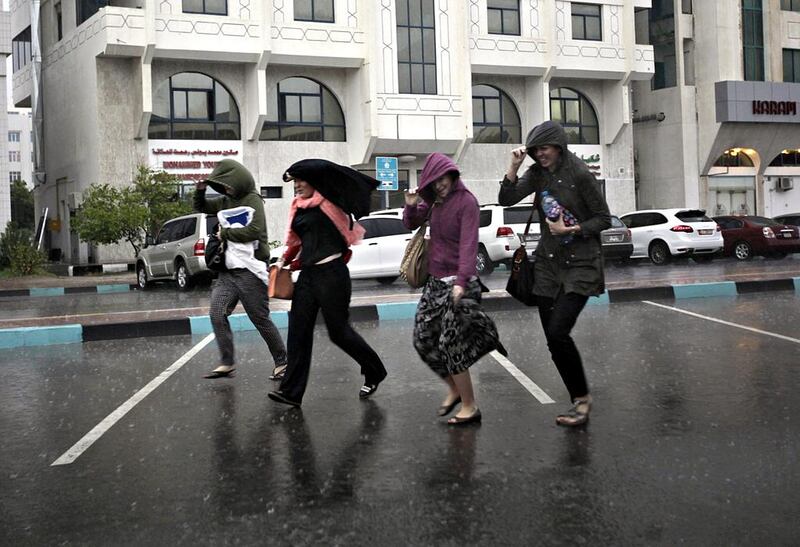 Heavy rain swept over Abu Dhabi Thursday morning as commuters went to work and school. Sammy Dallal / The National 



