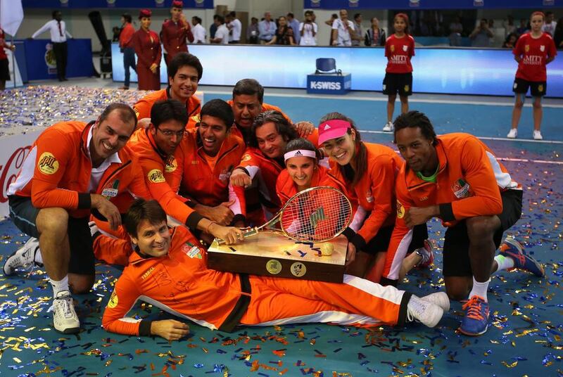 The Indian Aces celebrate after winning the IPTL title at the Hamdan Sports Complex in Dubai on Saturday. Ali Haider / EPA