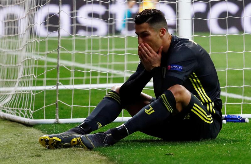 Juventus forward Cristiano Ronaldo reacts after missing a chance. Reuters