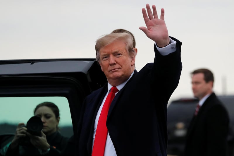 U.S. President Donald Trump waves as he arrives at Akron-Canton airport in Canton, Ohio, U.S., March 20, 2019. REUTERS/Carlos Barria