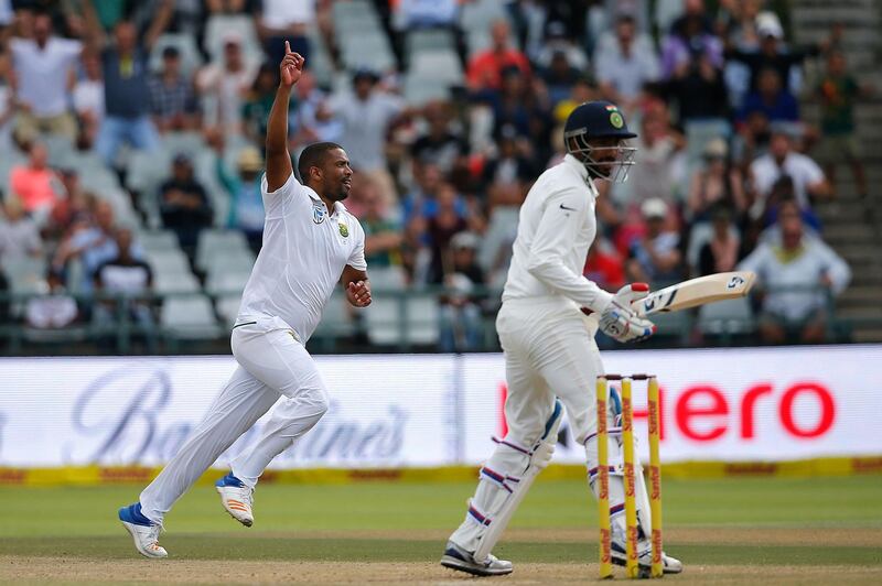South Africa bowler Vernon Philander celebrates dismissing India batsman Jasprit Bumrah and winning the match by 72 runs during day four of the First Test between South Africa and India in Cape Town, on January 8, 2018. / AFP PHOTO / MARCO LONGARI