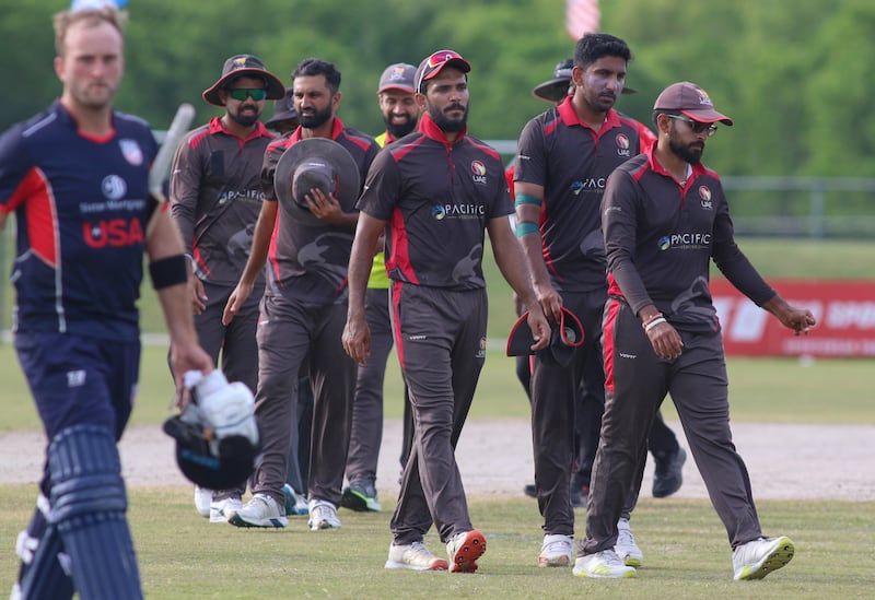 UAE players traipse from the field after their four-wicket defeat to United States in the Cricket World Cup League 2 in Texas. 