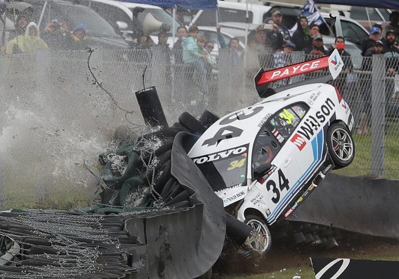 James Golding, driver of the  number 34 Wilson Security Racing GRM Volvo crashes into the wall on the opening lap of the Sandown 500 at the Sandown International Motor Raceway in Melbourne, Australia.  Robert Cianflone / Getty Images