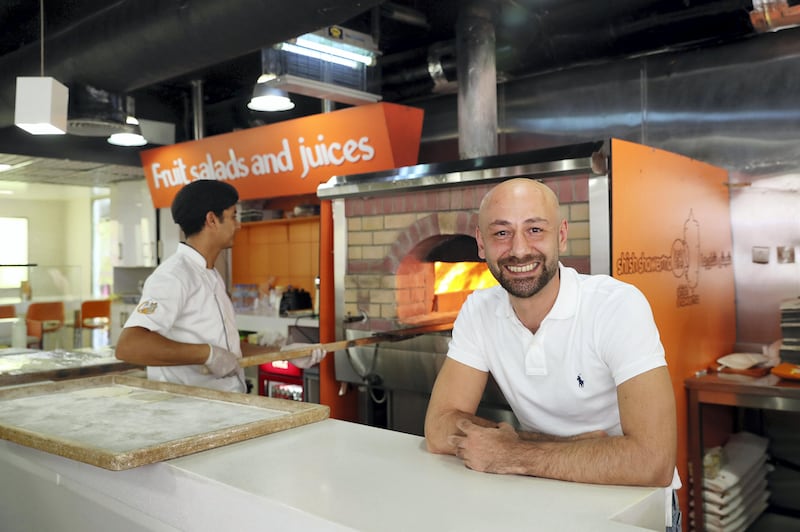 Abu Dhabi, United Arab Emirates - October 28th, 2017: Shish Shawerma shops founder Hazem Abu Hantash. Saturday, October 28th, 2017 at Corniche, Abu Dhabi. Chris Whiteoak / The National